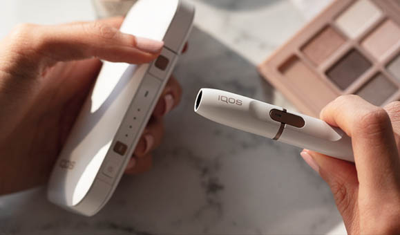 Man Holding IQOS 3 White