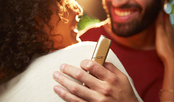 Man Holding IQOS 3 White