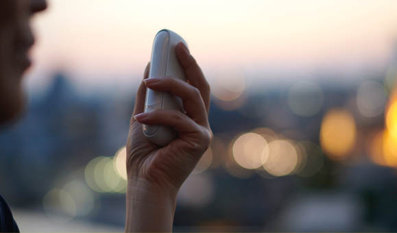 Man Holding IQOS 3 White