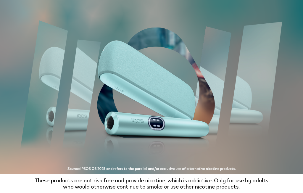 IQOS ILUMA device in Breeze Blue color in front of a mirror.