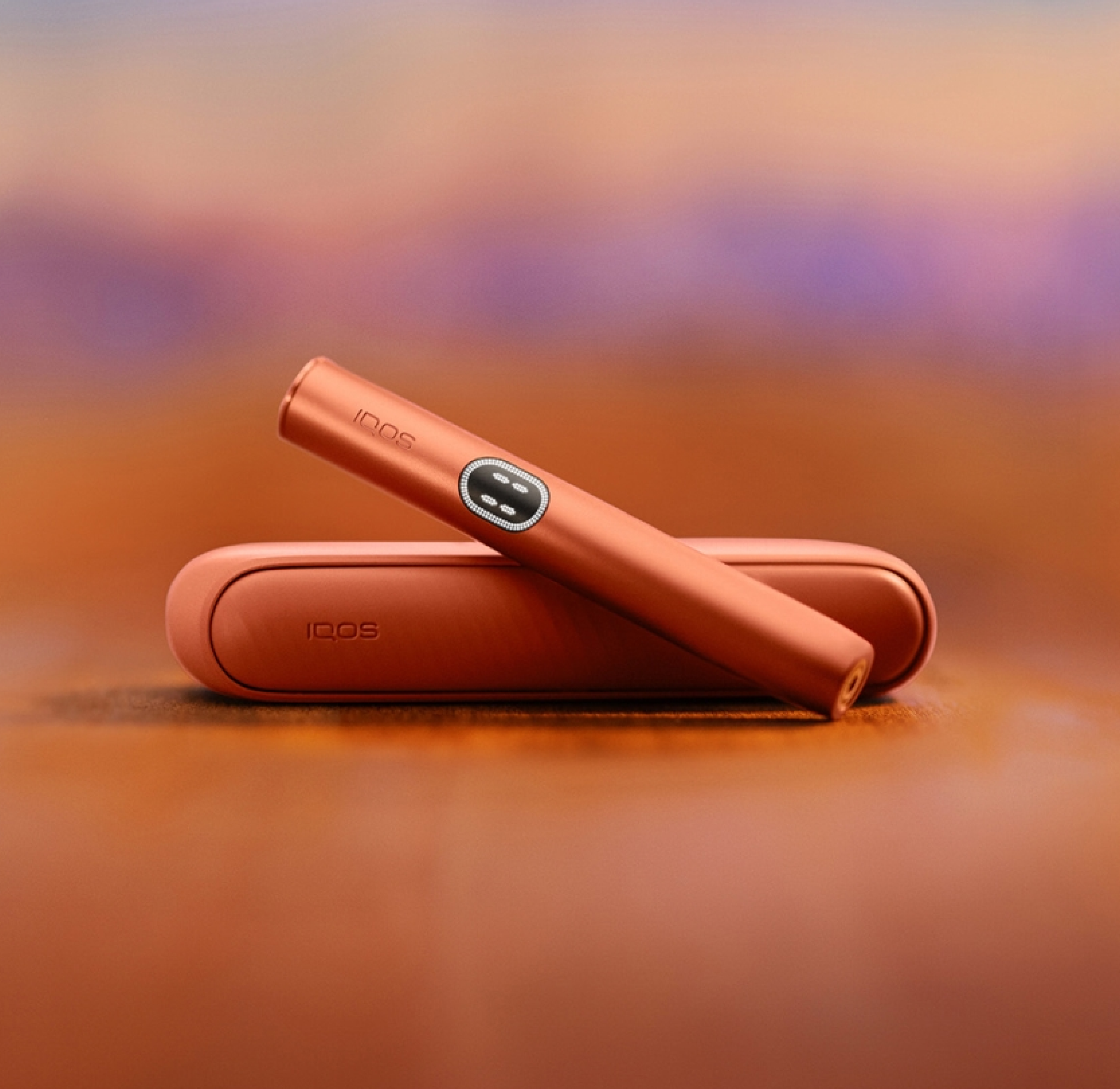 Breeze Blue IQOS ILUMA i  PRIME, IQOS ILUMA i and IQOS ILUMA i ONE devices, with the IQOS logo