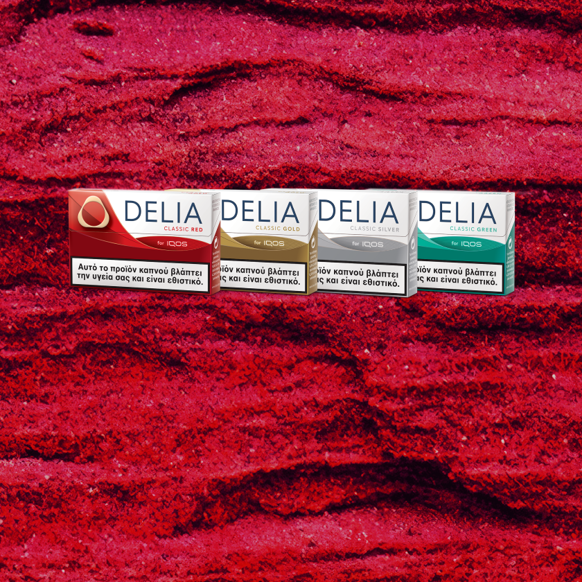 4 packs of DELIA tobacco sticks on a red patterned background.