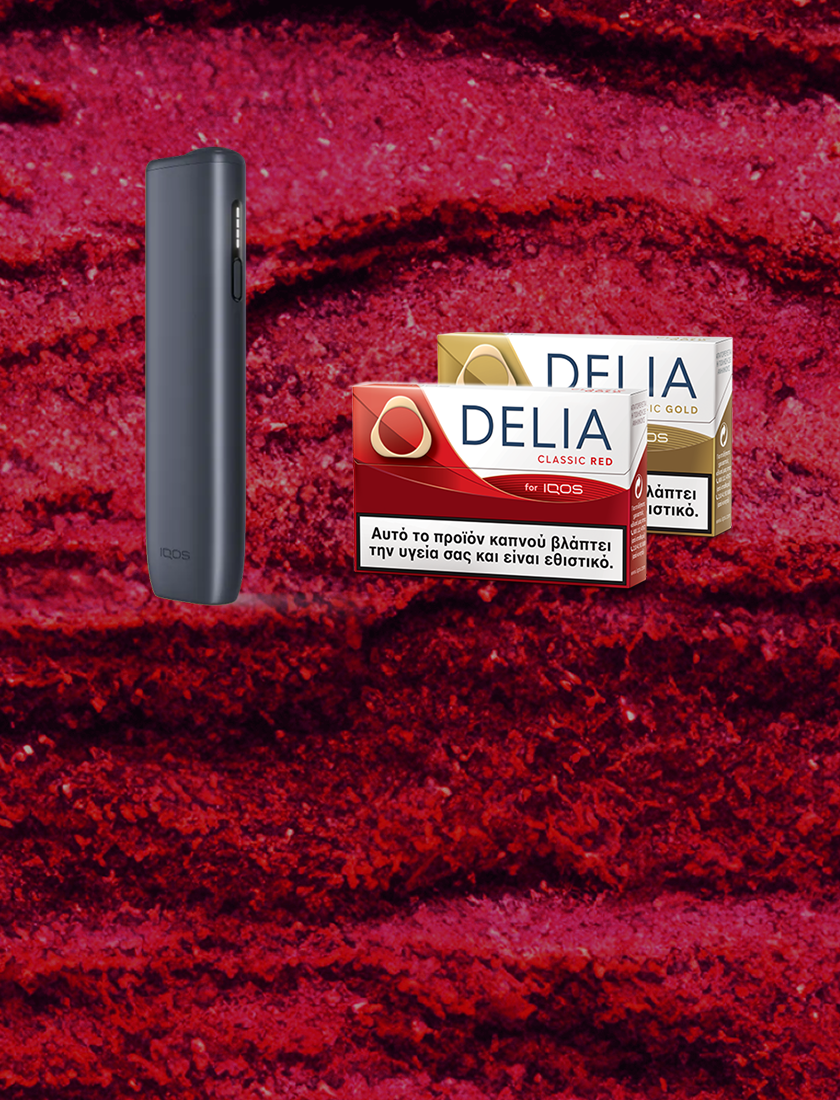 Two DELIA packs, Classic Red and Classic Gold with IQOS ILUMA i ONE Midnight Black device in a red textured background.