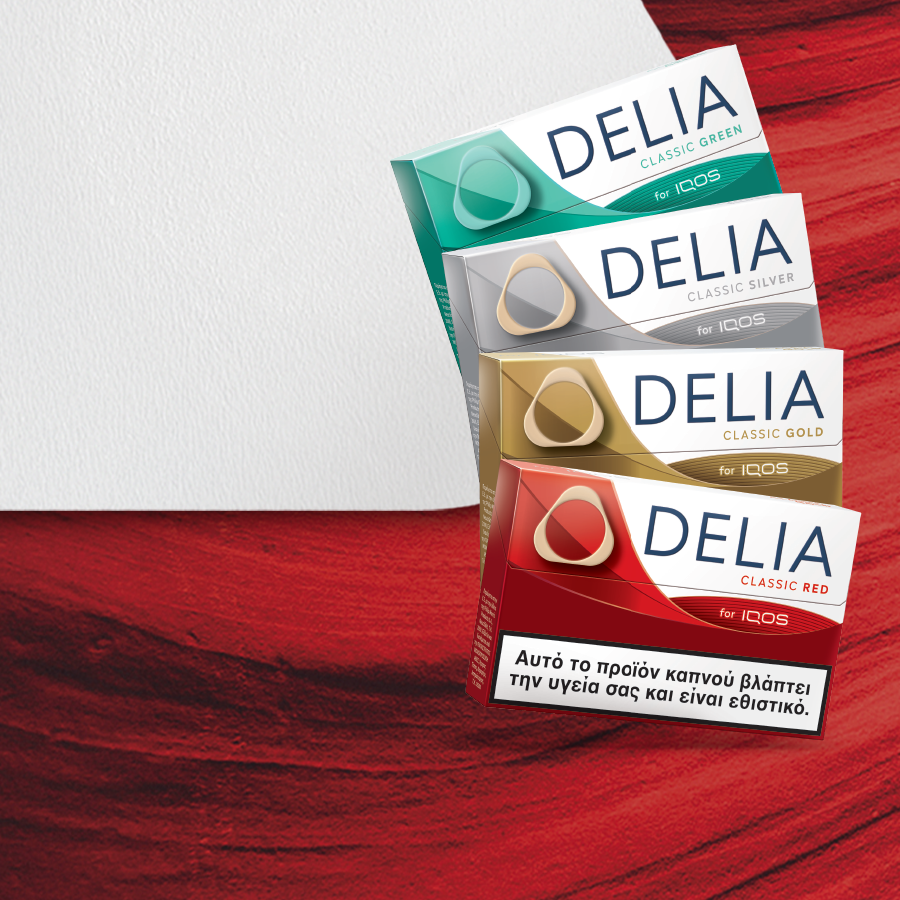 Δύο πακέτα DELIA, Classic Red και Classic Gold σε φόντο λευκό και κόκκινο.