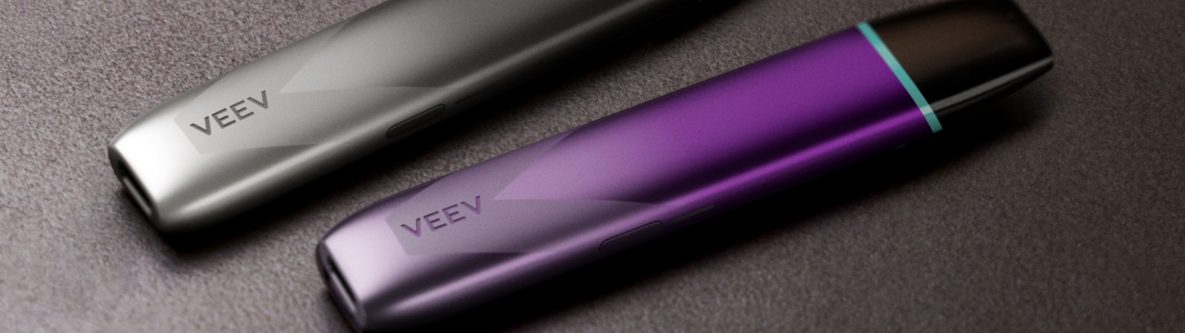 2 VEEV inPRIME devices in Slick Black and Orchid Magenta color.