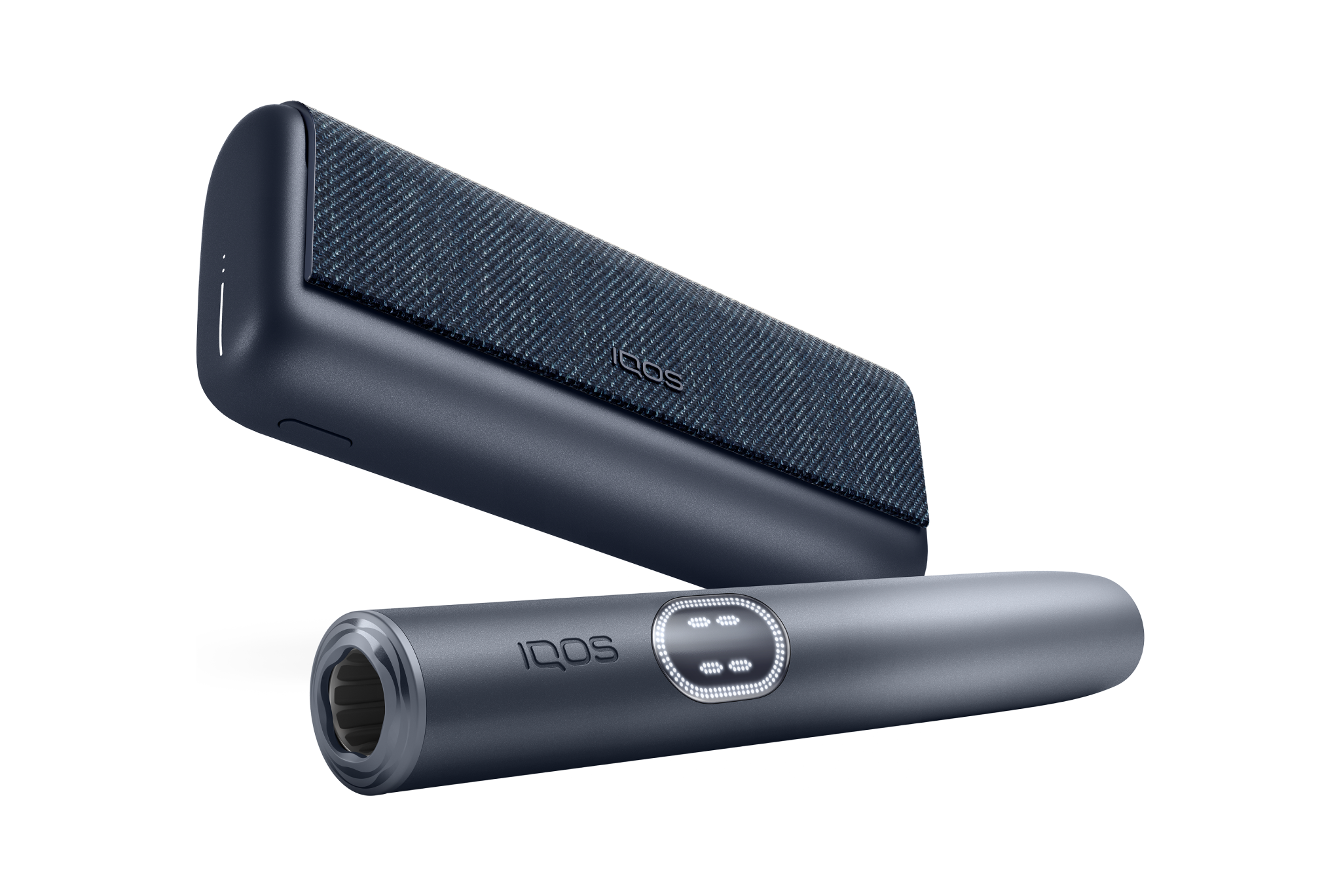 Aspen Green IQOS ILUMA i PRIME device below its charger