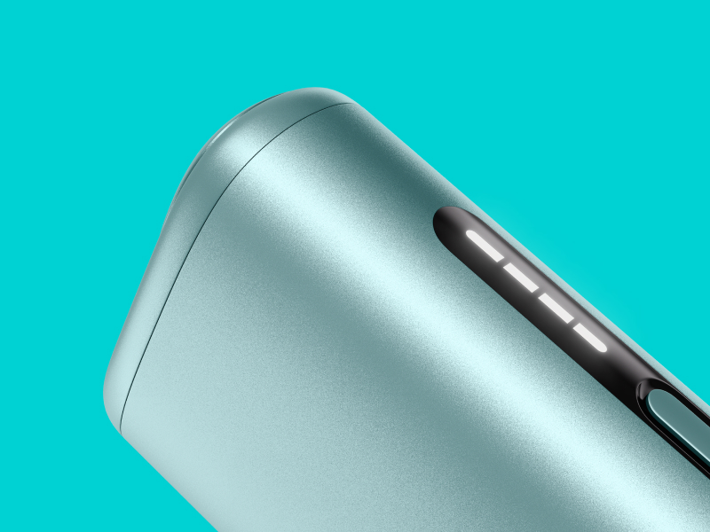Blue IQOS ILUMA i ΟΝΕ on a light turquoise background