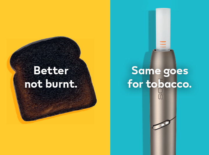 Burnt sausage on a fork compared to a clean IQOS HEETS stick in IQOS 3 DUO holder.
