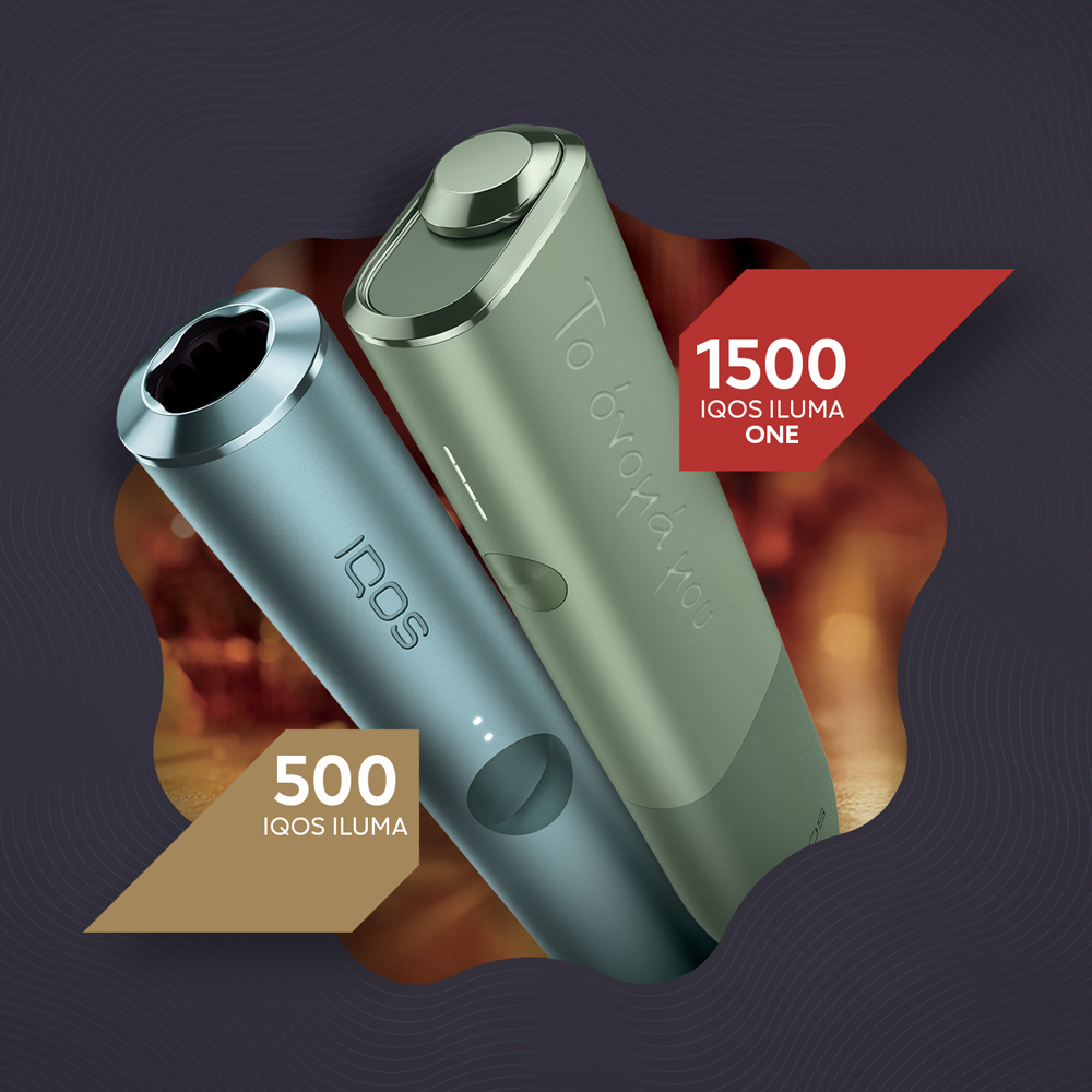 The image shows an IQOS ILUMA ONE and an IQOS ILUMA device. The moss green device is labeled with a red tag that reads "1500 IQOS ILUMA ONE." The blue device has "IQOS" written on it and is labeled with a brown tag that reads "500 IQOS ILUMA. The image shows an IQOS ILUMA ONE and an IQOS ILUMA device. The moss green device is labeled with a red tag that reads "1500 IQOS ILUMA ONE." The blue device has "IQOS" written on it and is labeled with a brown tag that reads "500 IQOS ILUMA.
