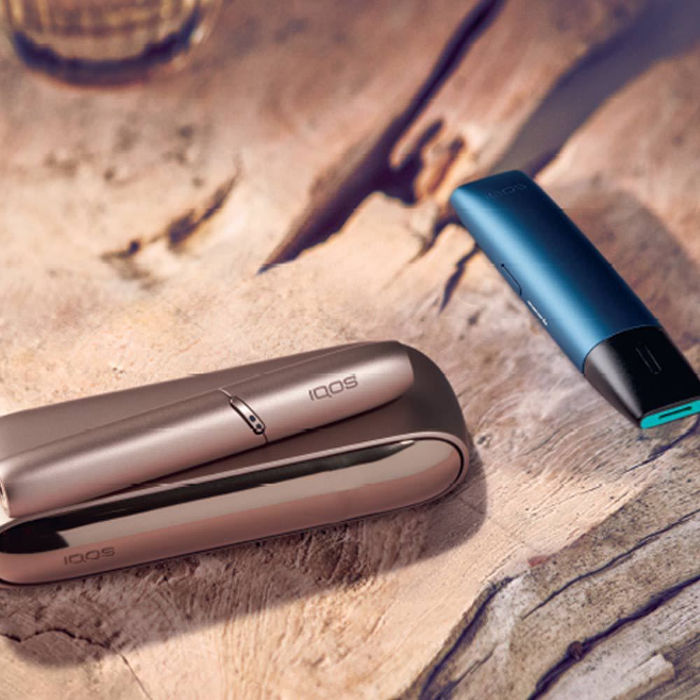 heated tobacco device IQOS 3 DUO and e-cigarette VEEV heated tobacco device IQOS 3 DUO and e-cigarette VEEV