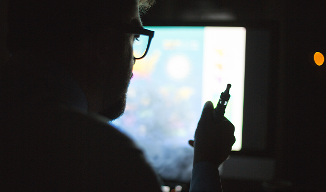 Man checking his e-cigarette